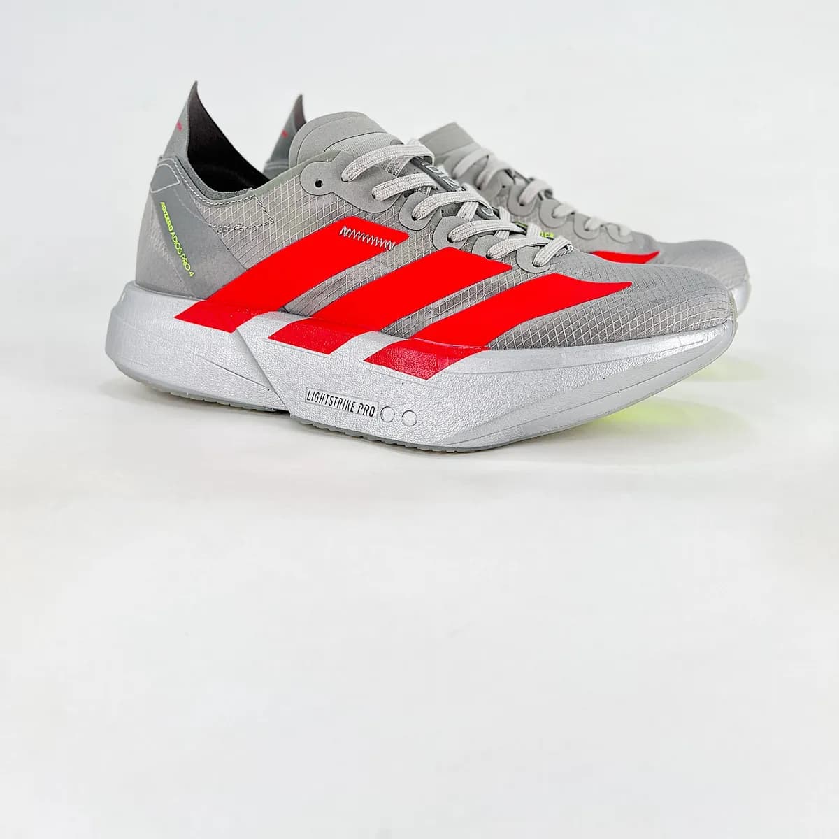 Adizero Adios Pro cinza e coral